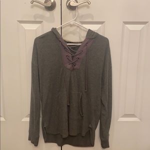Grey long sleeve shirt with purple lace-up